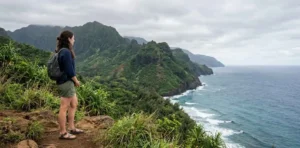 Traveler admiring Kauai coastal scenery